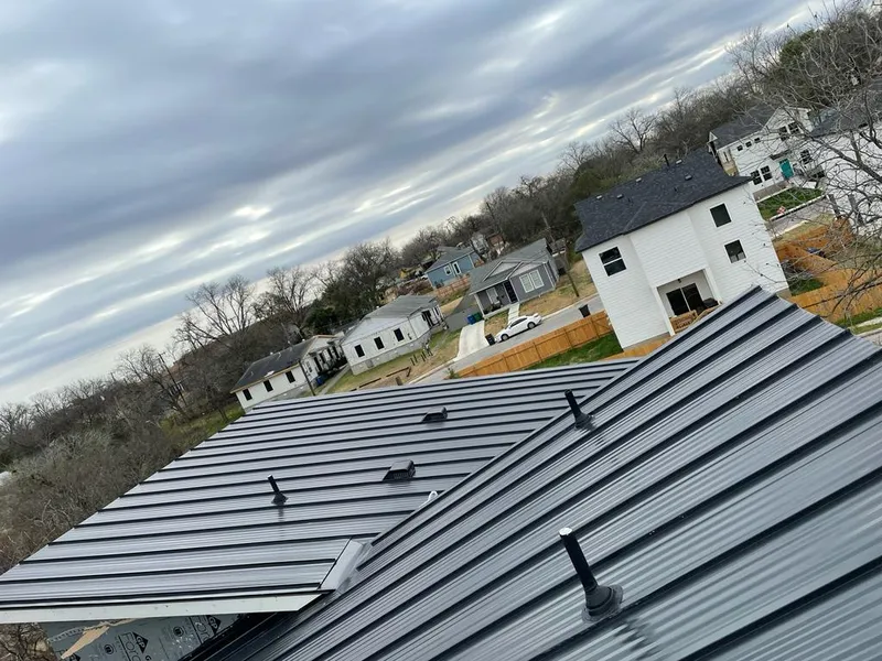 Standing seam metal roof panels with vents for Skylight Repair in Oak Forest